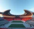 Futuristic sports stadium with advanced architectural design, featuring dynamic shapes and innovative technology, daytime setting, high detail, photorealistic
